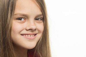 Image showing Close-up portrait of a smiling teenage girl