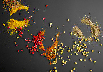 Image showing various spices on black background