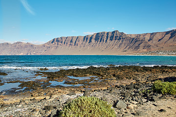 Image showing Landscape with volcanic hills and atlantic ocean in Lanzarote 