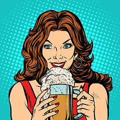 Image showing Beautiful woman with a mug of beer