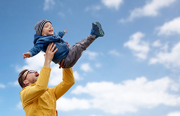 Image showing father with son playing and having fun outdoors