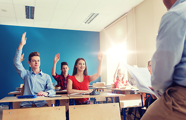 Image showing group of students and teacher with papers or tests