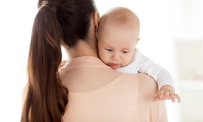 Image showing close up of little baby boy with mother