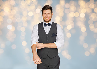 Image showing happy man in festive suit dressing for party