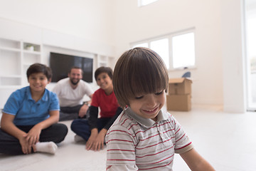 Image showing portrait of happy young boys with their dad