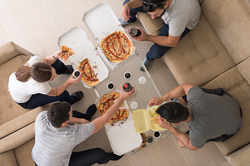 Image showing Pizza time a group of people