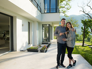 Image showing couple enjoying morning coffee