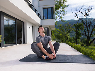 Image showing man doing morning yoga exercises