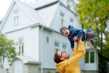 Image showing father with son playing and having fun outdoors