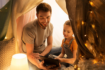 Image showing family with tablet pc in kids tent at home