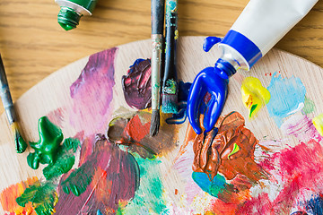 Image showing acrylic color or paint tubes and palette