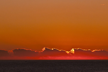 Image showing Sunset landscape with ocean and clouds