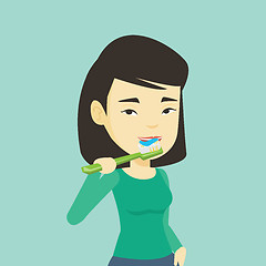 Image showing Woman brushing her teeth vector illustration.