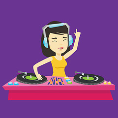 Image showing DJ mixing music on turntables vector illustration.