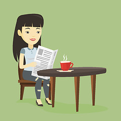 Image showing Woman reading newspaper and drinking coffee.