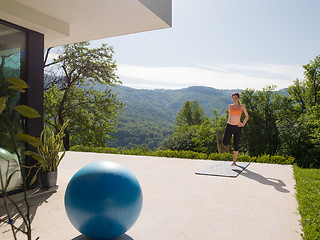 Image showing woman doing morning yoga exercises