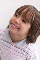 Image showing little boy who looking up