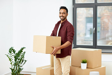 Image showing happy man with box moving to new home