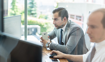 Image showing Business team analyzing data at business meeting.