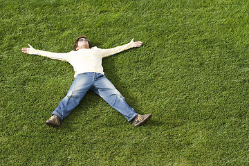 Image showing Sleeping on the grass