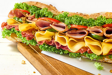 Image showing Tasty hamburger, beef burger in close-up on a plate and on white background.