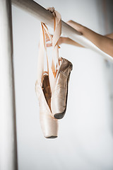 Image showing Close up view of pointes for ballet on barre