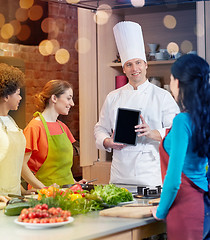 Image showing happy women with chef and tablet pc in kitchen