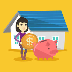 Image showing Woman puts money into piggy bank for buying house.