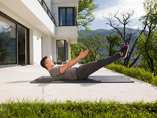 Image showing man doing morning yoga exercises