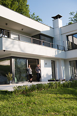 Image showing couple enjoying on the door of their luxury home villa