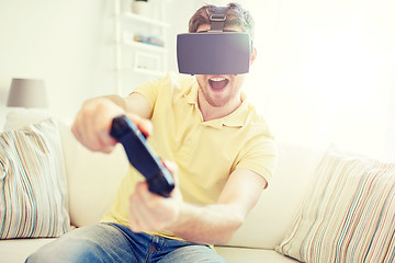 Image showing man in virtual reality headset with controller