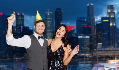 Image showing happy couple party in night singapore city