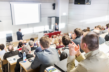 Image showing Business speaker giving a talk at business conference event.