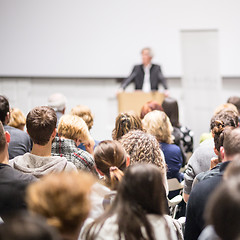 Image showing Business speaker giving a talk at business conference event.