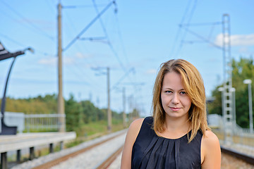 Image showing Portrait of girl near railway path