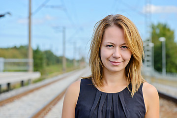 Image showing Portrait of girl near railway path