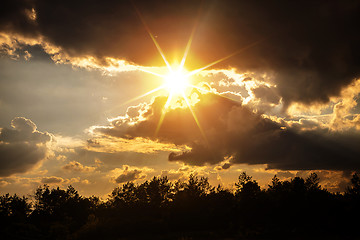 Image showing sunset with dark clouds 