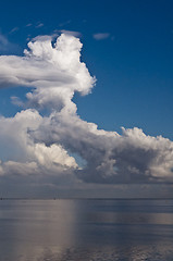 Image showing White clouds and blue ocean. 