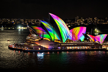 Image showing Sydney Opera House illuminated with beautiful vibrant multi colo