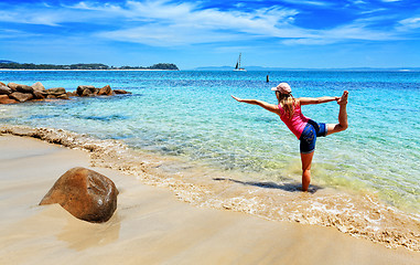 Image showing Holiday yoga on a secluded beach