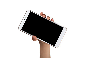 Image showing Child holding a smartphone with one hand