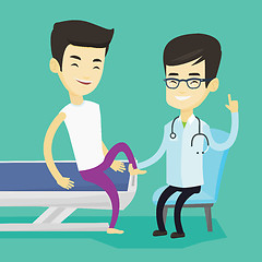 Image showing Gym doctor checking ankle of a patient.