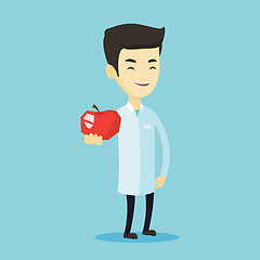 Image showing Nutritionist offering fresh red apple.