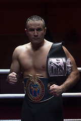 Image showing kick boxer with his championship belt