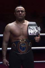 Image showing kick boxer with his championship belt