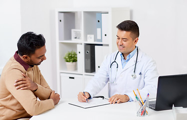 Image showing happy doctor and male patient meeting at hospital