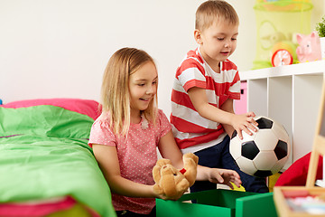 Image showing happy kids with toys at home