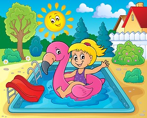 Image showing Girl floating on inflatable flamingo 2