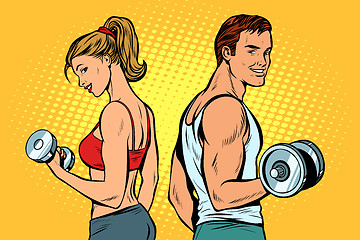 Image showing man and woman with dumbbells