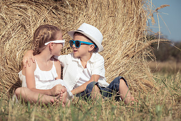 Image showing Happy children playing in the park at the day time.